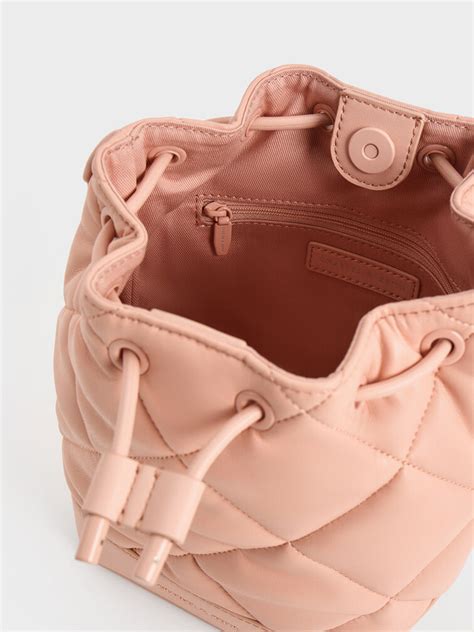 pink bucket bag with gold holder ring|Pink Lin Quilted Bucket Bag .